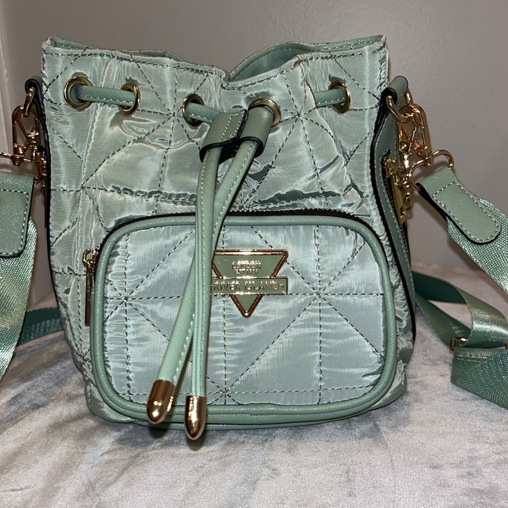 Small quilted mint green River Island cross body
